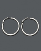 Eternally stylish and effortlessly chic. Giani Bernini's hoop earrings feature a tube shape and sterling silver setting. Approximate diameter: 1-1/2 inches.