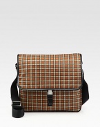 Plaid pattern shaped in a slim silhouette of tessuto nylon, for maximum comfort and wearability.Flap closureAdjustable shoulder strapInterior zip pocketsNylon11¾W x 10½H x 2½DMade in Italy