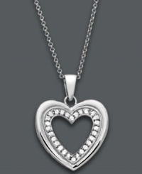 Sweet simplicity. Capture her heart with Victoria Townsend's diamond heart pendant. Crafted in sterling silver and decorated by an inner row of round-cut diamonds (1/4 c.t. t.w). Approximate length: 18 inches. Approximate drop: 1 inch.