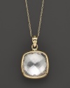 A bold, faceted crystal quartz glitters in a 14K yellow gold setting.