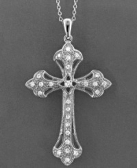 Antiquated style with sparkling beauty. This intricate cross pendant features round-cut diamond (1/4 ct. t.w.) set in 14k white gold. Approximate length: 18 inches. Approximate drop: 1-5/8 inches.