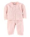 Knit in ultra-soft cotton with a delicate pointelle-knit pattern, the cardigan-and-pant set is an essential for baby.