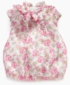 Dress her up in ruffles and roses with this cute dress by First Impressions.