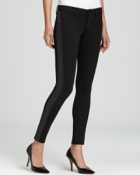 A tonal take on the tuxedo trend, this pair of James Jeans features supple faux leather stripes and a sublime skinny fit.