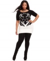 Answer the call of the wild with Baby Phat's plus size sweater dress, featuring an animal print.