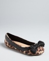 Accent her dressier wardrobe with a spot of cheetah print with Juicy Couture's striking Rani ballet flats.