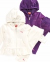 Keep her sporty look girlie with one of these ruffly jacket and pant sets from Puma.