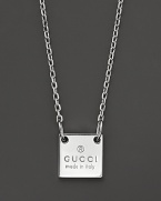 This sterling silver chain bears a Gucci trademark square pendant.