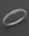 Signature sterling woven chain bracelet with carved chain clasp, designed by John Hardy.