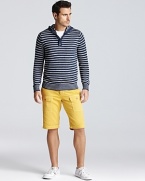 Narrow stripes lend a modern nautical appeal to this handsome hooded henley from Vince.