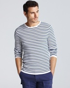 Narrow stripes add a nautical appeal to this lightweight sweater from Vince.