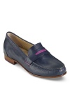 Blocked pops of color take these penny loafers from prep school to a masters degree in fashion; by Cole Haan.