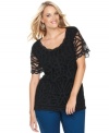 Sheer perfection: INC's short sleeve plus size top, featuring an elegant lace front-- dress it up with trousers or down with denim. (Clearance)