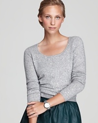 A light dusting of sequins lends effortless glamour to a C by Bloomingdale's sweater, flaunting an exaggerated scoop neckline for an alluring silhouette.