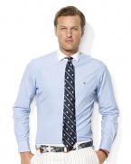 An end-on-end woven cotton poplin shirt is tailored in a trim, modern fit for timeless style.