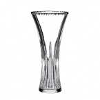 The vertical cuts tracing the neck of this traditional Waterford crystal vase reflect light with singular prismatic opulence.