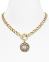 Get spotted in this bold charm necklace from T Tahari. Not only does this style boast classic chunky chain links, but it comes accented by an exotic animal-print charm.