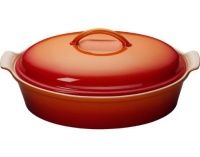 Le Creuset Stoneware 4-Quart Covered Oval Casserole, Flame