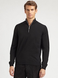 An easy, everyday pullover featuring a half-zip front with contrast trim and fitted ribbed cuffs.Ribbed mockneck collarHalf-zip frontLong sleeves with ribbed cuffsRibbed hemMerino woolDry cleanImported