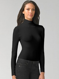 Smooth, opaque mix of Austrian cotton and nylon is finished with a cozy turtleneck that's perfect for layering. Pullover style Cotton/nylon/elastene Machine wash or dry clean Made in Austria