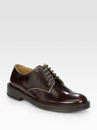 Perfectly polished with contrasting trim defines this traditional lace-up for the contemporary man of style.Leather upperLeather liningPadded insoleLeather soleMade in Italy