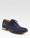 Derby style lace-up, crafted in burnished navy leather, lends the look and feel of a well-worn favorite.Leather upperLeather liningPadded insoleLeather soleMade in Italy