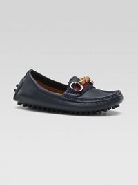 A slip-on style with a grown-up look and lots of Gucci details, including striped webbing, a bamboo horsebit and a sophisticated driver sole.Leather upperStriped webbed detailBamboo horsebit with golden hardwareRubber driver soleMade in Italy