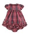 A classic, timeless plaid is transformed into an adorable babydoll dress with requisite ruffle trim along the neck and hem.