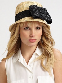 This sweet design showcases a large, whimsical bow. StrawBrim, about 2Cotton linedClean with damp clothMade in Italy 