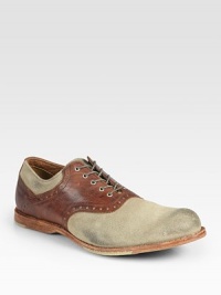 Classic lace-up with the right amount of distressing to offer the look and feel of a well-worn favorite.Leather upperLeather liningPadded insoleWood/rubber soleImported