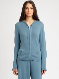 EXCLUSIVELY AT SAKS. A long-sleeve hooded staple rendered in sumptuous cashmere for the ultimate in luxe casual wear. Drawstring hoodDropped shouldersLong sleevesZip front closureKangaroo pocketsRolled cuffs and hemCashmereDry cleanImported