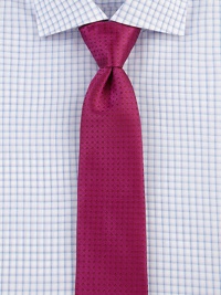 Tonal dots adorn this tie of rich Italian silk, perfect for every gentleman. SilkDry cleanItaly