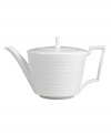 Steeped in history, the Intaglio teapot from Wedgwood features modern bone china embossed with geometric motifs from the Georgian era. With a patterned lid and distinct handle design.