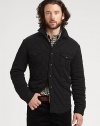 A unique quilted shirt-jacket, designed for lightweight warmth features leather detailing at the elbows and collar for a hint of rugged edge.Button-frontChest flap pocketsFully linedAbout 30 from shoulder to hemCottonDry cleanImported