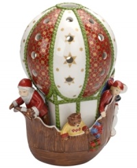 Up and away! Much more than a votive holder, this Villeroy & Boch hot air balloon carries special passengers to all your holiday celebrations with a distinct vintage feel. Pierced detail allows candlelight to stream through.