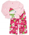 She'll be all smiles when she's waiting for Santa in this holiday pajama top and pants set from Carter's.