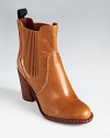 MARC BY MARC JACOBS reinvents the chelsea boot in richly-hued leather with utilitarian details. These trend-right booties effortlessly transition from season to season--as perfect with chunky sweaters as they are with floating dresses.