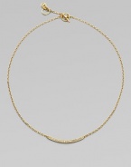 A delicate style featuring a curved bar encrusted in sparkling rhinestones on a link chain. Goldtone brassGlass stonesLength, about 16Toggle closureImported 