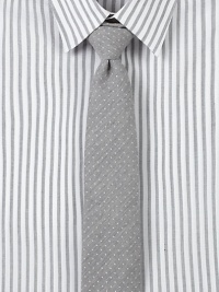 Slightly textured pindot tie adds finishing touches to any modern dress wardrobe.57% cotton/43% silkDry cleanMade in USA