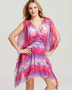 In a vibrant, colorful print, Gottex's caftan-style coverup lends glowing style to beach-bound outings.