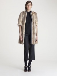 Short, cuffed sleeves and a soft wool collar lend a modern look to this plush fur style.Wool stand collarZip frontElbow-length sleevesSide slash pocketsFully lined96% Ferret-Badger fur/3% wool/1% cashmereDry cleanMade in Italy of imported fabricFur origin: ChinaModel shown is 5'11 (180cm) wearing US size 4. 