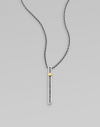 From the Nile Collection. A stunning vertical bar of sterling silver set with sparkling white topaz and accented in glowing goldplating, on a bold silver chain.White topazSterling silverGoldplatedChain length, adjusts from about 16-18Pendant length, about 1¼Lobster claspImported