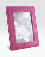 Display your memories in this handmade frame, wrapped in python-embossed leather with sturdy metal easel and convenient rear drop-down door for easy access.LeatherMade in USA DIMENSION INFORMATION 4 X 65 X 7