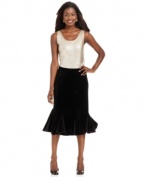 Be dazzling this holiday season in JM Collection's flattering flared skirt, made of soft velour.