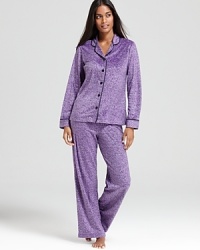 Ready, set, sleep in LAYLA's cheetah-print pajamas with contrast trim and a classic notch-collar top.