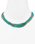 Take your jewel box in a tropical direction and opt for MICHAEL Michael Kors' turquoise torsade necklace. The cool collar punches up neutral palettes and all-black with island-inspired color.