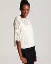 Joie's sheer lace top lends ladylike romance to your fall repertoire. Anchor the whimsical feel with skinny cargos.