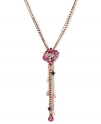 This Y-shaped necklace from Betsey Johnson is a colorful creation that flaunts fuchsia-colored crystal gem clusters, glass pearl bow accents, multi-chains with faceted beads, hematite tone bubble hearts and fuchsia-colored crystal teardrop. Crafted in antiqued gold tone mixed metal. Approximate length: 16 inches + 3-inch extender. Approximate drop: 5-1/4 inches.