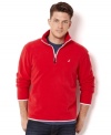 Layer-up for the season with this classic half-zip pullover from Nautica.