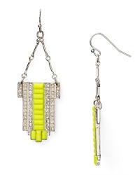 Electric shades are a bright way to accent every look, and these neon earrings from Aqua are wholly head-turning. We love this pair's chunky look - rock them against a neutral palette for a color-pop contrast.